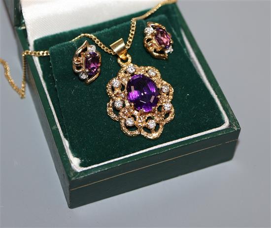 An 18ct gold amethyst and diamond cluster pendant on 18ct chain and a pair of similar 9ct gold ear studs.